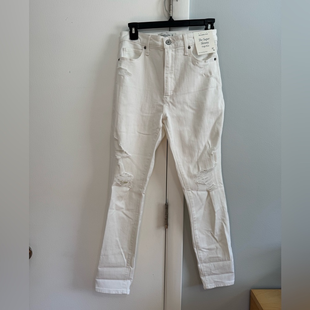 Abercrombie and fitch. Women's White Distressed Jeans. Size 27 / 4s